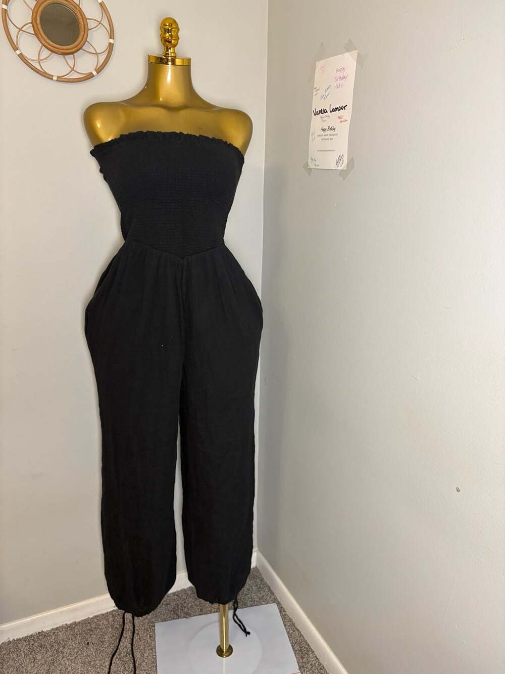 Abercrombie & Fitch strapless jumpsuit in black.